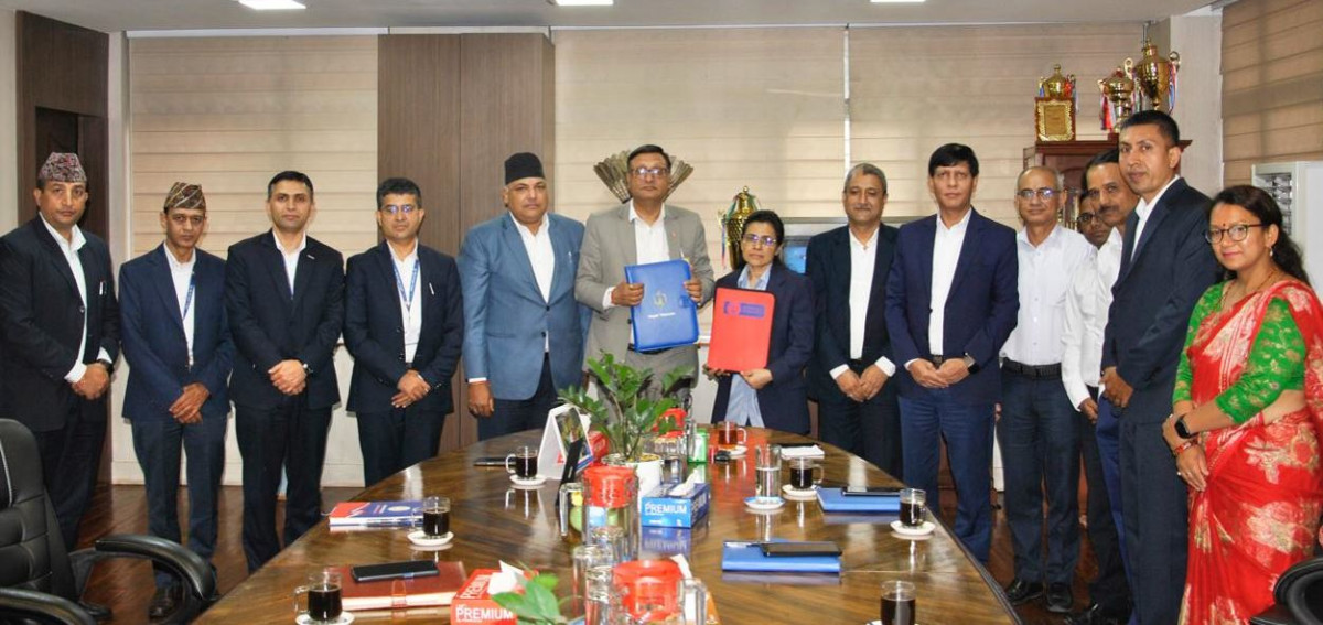 राष्ट्रिय वाणिज्य बैंक र नेपाल टेलिकमबीच सम्झौता